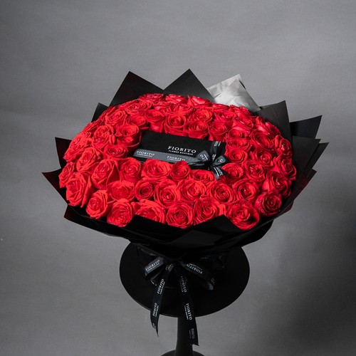 Pure Luxury - Elegantly wrapped red roses with French chocolates. A heartfelt gift ideal for anniversaries, birthdays, or expressing your love.