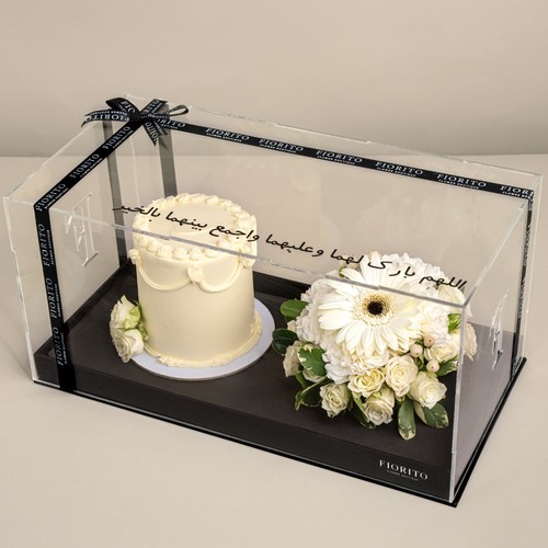 Best Wishes - Acrylic box with roses, gerbera and a cake, perfect for birthdays, anniversaries, or any occasion worth celebrating.