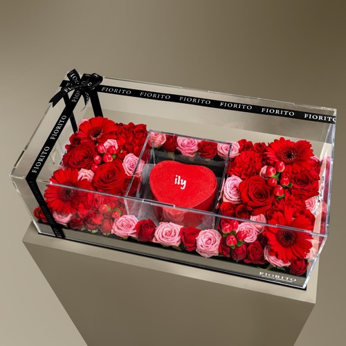 Eternal Love - Baby roses, gerbera and carnation in an acrylic tray with a cake. A charming way to express your affection, love and appreciation for someone special. Note: Cake writing is customizable.