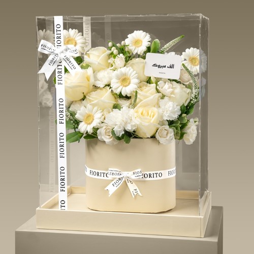 Crystal Harmony - An acrylic box filled with baby roses, hypericum, gerbera, and carnations. A peaceful and elegant way to express your wishes for their accomplishments.