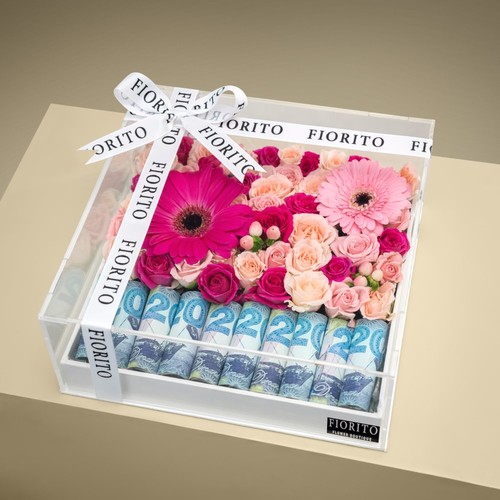 Blooming Wishes - An acrylic tray filled with baby roses, gerbera, and hypericum with space for cash gifts. An ideal gift to draw a smile on any occasion. Note: Money is not included.