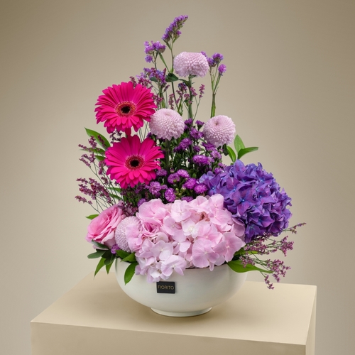 Majestic Blooms - A sophisticated vase filled with chrysanthemum, hydrangea, and roses. On any occasion, it's the ideal present to let them know how much you appreciate them.