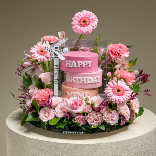 Pink Charm - A reflective glass tray with baby roses, alstroemeria, gerberas, and a cake. Makes it a perfect birthday gift that brings joy and happiness. Note: cake writing is customizable.