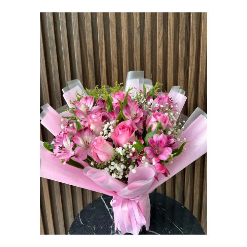 Lulu Bouquet - A mixture of roses and alstroemeria in pink, and the addition of gypsophila