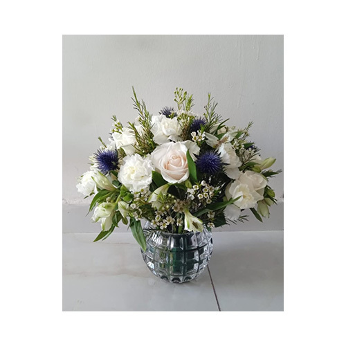 Amani Vase - It contains different flowers such as white roses, cherries and alstroemeria.