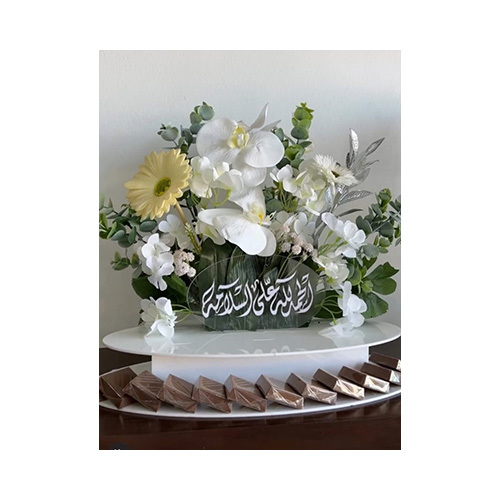 Flowers Stand - A stand decorated with artificial or natural flowers of your choice and containing Belgian chocolate.