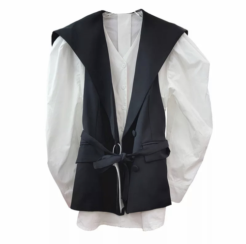 White shirt with black vest