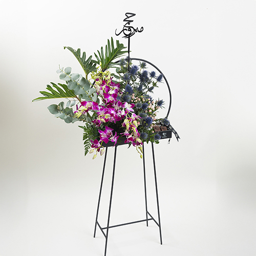 The Bast - Metal Stand with baby orchid with chocolate and acrylic name size : 100×40 cm