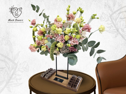 party - Metal stand with beautiful flower arrangement of a mix of Dutch and Ecuadorian flowers to suit all tastes 45/35cm