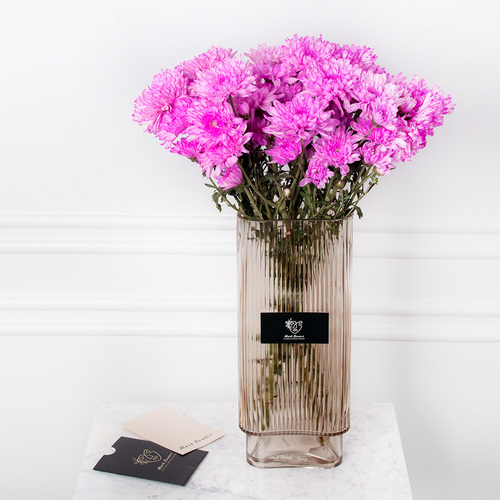 Nancy Bouquet - A bouquet containing chrysanthemum flowers with a box of chocolates.