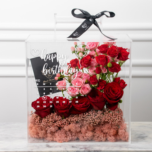 Blacksy Birthday - A bouquet featuring roses and gypsophila.