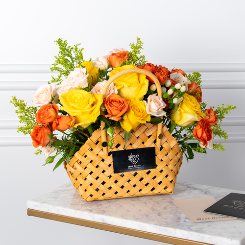 Gago Basket - Roses and baby roses arranged beautifully in a basket with a card.