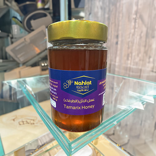 Athel Honey (Tamarisk) - 500 Grams Athel honey or wild tamarisk honey has several benefits and features, including: 
 1. *Antibacterial properties*: It contains ingredients that help fight bacteria and germs. 
 2. *Immune system support*: It is rich in antioxidants that boost the body's immunity. 
 3. *Soothing*: It is known for its soothing properties, which helps relieve stress and anxiety. 
 4. *Better digestion*: It works as an aid in improving the digestion process and getting rid of stomach problems. 
 5. *Wound healing*: It is used topically for its ability to accelerate the healing of wounds and burns. 
 6. *Anti-inflammatory*: It contains substances that act as anti-inflammatories, which helps relieve pain and swelling. 
 7. *Source of energy*: It is rich in natural carbohydrates that give the body immediate and sustainable energy. 
 If you are looking for a natural product to support your overall health, Athl honey can be a good choice.