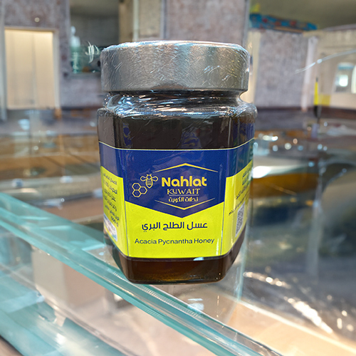 Wild Talh Honey - Package 500 grams Features 1. *High quality and purity*: - It is extracted from the flowers of the wild acacia tree, which grows in desert areas, ensuring purity and high quality. 
 2. *Distinctive taste*: - It has a unique and distinctive taste that differs from other types of honey, which makes it desirable to add to foods and drinks. 
 3. *Multiple health benefits*: - *Antibacterial and antifungal*: It contains properties that help fight bacteria and fungi, making it useful for treating wounds and skin infections. - *Immunity booster*: It helps strengthen the immune system thanks to its components rich in vitamins and minerals. - *Improving digestion*: It contributes to calming the stomach and improving the digestion process, and may help treat digestive problems such as ulcers. 
 4. *A rich source of antioxidants*: - It contains antioxidants that help protect the body from free radicals, which reduces the risk of chronic diseases. 
 5. *Regulate blood sugar levels*: - Eating it moderately and regularly may help regulate blood sugar levels. 
 6. *Support heart health*: - Contains ingredients that contribute to improving cardiovascular health. 
 7. *Enhance energy*: - It acts as a natural source of energy thanks to its content of natural sugars, which helps increase activity and vitality. 
 8. *Cosmetic uses*: - It can be used in the preparation of cosmetics and skin treatments due to its moisturizing and nourishing benefits. 
 9. *Reducing inflammation*: - It contains anti-inflammatory properties that may help reduce swelling and pain in the body. 
 10. *Soothing properties*: - It helps calm the nerves and reduce stress, which contributes to improving the quality of sleep and relaxation. 
 11. *Traditional medical uses*: - It is traditionally used to treat coughs, colds and sore throats, as well as to enhance the health of the respiratory system. 
 With these features, wild talh honey is an excellent choice for those looking for health benefits and a distinctive flavour at the same time.