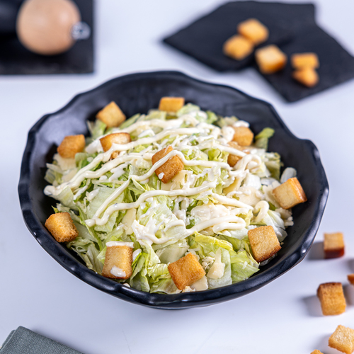 Caesar Salad - Caesar Salad Lettuce In Caesar Dressing Topped With Parmesan Cheese& Roasted Bread