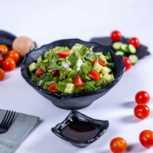 Green Salad - Cucumber, tomato, parsley, mint, lemon juice, olive oil, and vinegar.