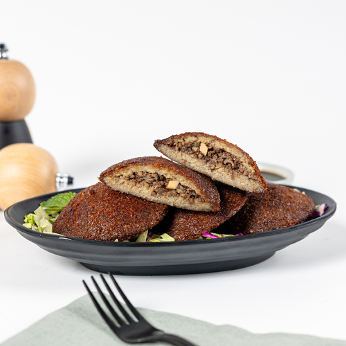 Caboria - kebah Sajiyeh - Fried Kibbeh Stuffed With Minced Meat, Walnuts, and Pomegranate