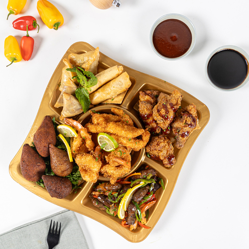 Hot Appetizer Combo - Breaded shrimps, bulgur kebbeh, potato kibbeh, sausage, chicken wings, mixed samosa, chicken fingers, onion rings.