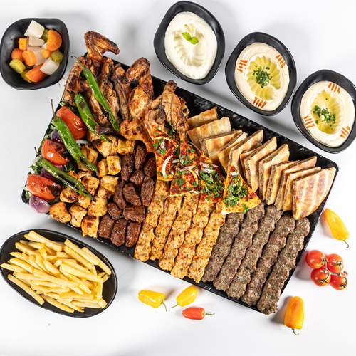 Dewaneah Platter - 5 meat kebab, 5 chicken kebab, 2 skewer tikka, 3 skewer tawook whole charcoal grilled chicken, 12 pieces of Arayes, 2 Hommous