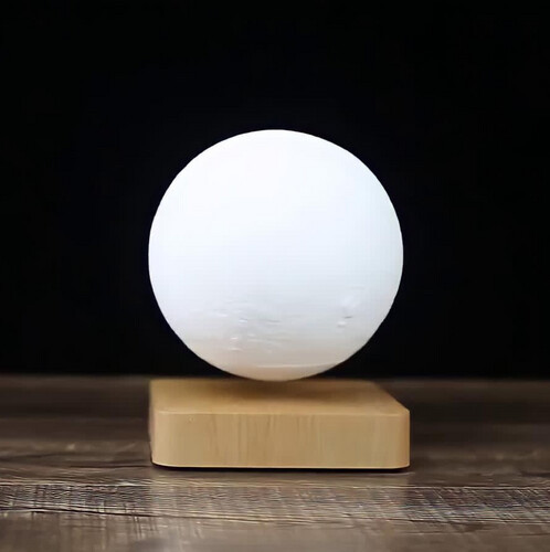 Light base moon - Light brown base levitating moon in 3 different shades (white/yellow/orange) can be changed by touching the base. Best gift for loved ones.