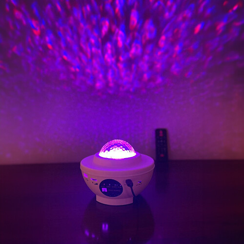 Star Projector Speaker - White color, Bluetooth, USB disk speaker with multi colors starry effects with laser. for Nigh light, Festivals, Home parties, Game rooms and more. Comes with remote control and USB wire for power supply.