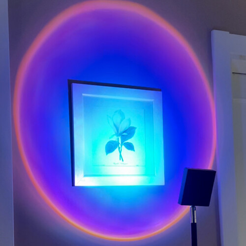 Sunset Purple - Purple light projector . Adjustable in many shapes and sizes for walls and ceilings. Could be used on paintings or art pieces.