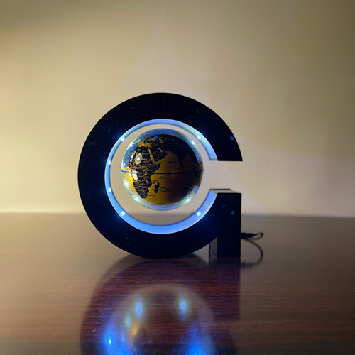 G-shape Levitating Globe - G shape LED ring centered by a golden/black globe, levitating and spinning. Could be left on Day and Night.