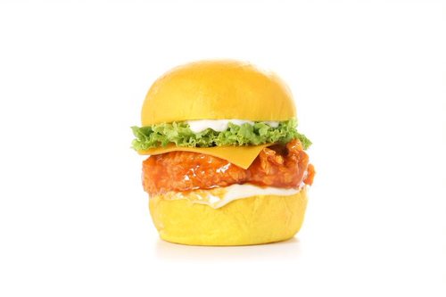 BUFFALO CHICKEN SLIDER - Freshly baked Potato bun, Crispy Fried Chicken Fillet, Lettuce, Cheddar Cheese Served with Honey-Glazed Buffalo Sauce.