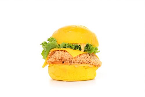 SPICY CHICKEN SLIDER - Freshly baked Potato bun, Crispy Fried Chicken Fillet, Lettuce, Cheddar Cheese Served with Spicy Sauce.