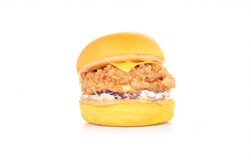 CHEESY CHICKEN BURGER - Freshly baked Potato bun, Crispy Fried Chicken Fillet infused with Cheese, Cheddar Cheese, Served with Coleslaw and Trend Special Sauce.