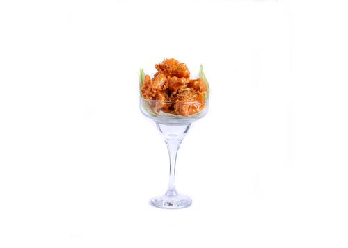 Trend Burger - DYNAMITE SHRIMP - Breaded Shrimp, coated with Dynamite sauce, garnish with  spring onion.