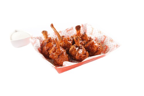 BUFFALO WINGS - Perfectly fried chicken wings tossed with Buffalo Wing Sauce served with cool Ranch Sauce.