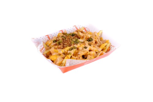 COMMANDO FRIES - Hand-cut potatoes deep-fry to golden brown. Topped with Cheddar Cheese sauce, Fried Onions, Chopped Jalapeños and doused with Commando sauce