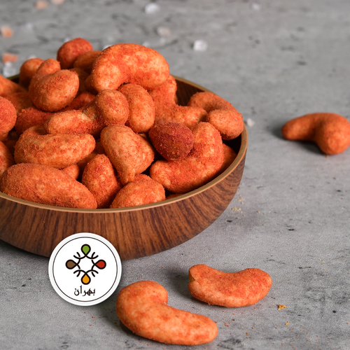 Coated cashews with ketchup flavour