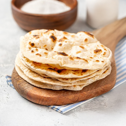 two pieces of tanoor bread