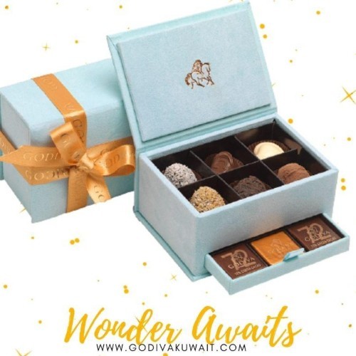 Luxury Velvet Light Blue Box - Mini Velvet box - contains 18pcs chocolates, 6 assorted chocolates and 12 Godiva Carre.

Small Velvet box - This box contains 30 different types of Godiva chocolates and 30 Carres 

Large Velvet box - This box contains 48 different types of Godiva chocolates and 70 Carres.

Extra Large velvel box - This box contains 56 Assorted Godiva chocolates and 144 Godiva Carres.