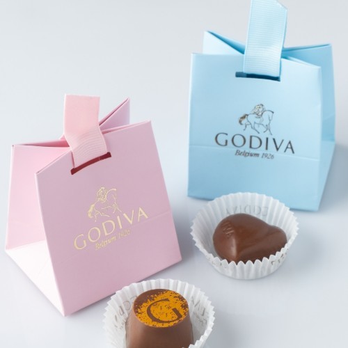 GODIVA CHOCOLATIER - Chocolate Gift Bag - A gift bag containing chocolate. (Available in pink and blue).