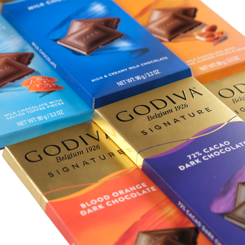 شوكولا جوديفــــا - Godiva Signature Tablet 90g - Discover Godiva's Signature Tablet, the creamiest milk, crunchy roasted almond, smooth dark chocolate, dark chocolate enhanced with blood orange. The choice is yours. Godiva tablets are large enough to share – or to keep as a special treat all for yourself.