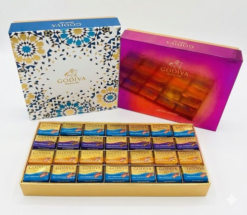 Napolitan Box - Contains 84 pieces or 56 pieces assorted Godiva Napolitan chocolates. Milk chocolate, Dark chocolate & Milk chocolate with hazelnut.