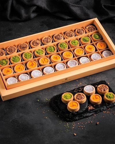Ghariba mixed with nutella, saffron, pistachio and caramel