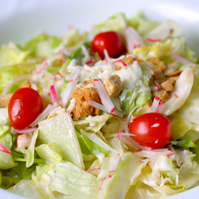 Caesar Salad - Fresh lettuce, parmesan cheese, croutons with caesar dressing.