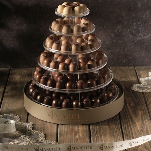 Chocolate Tower - Chocolate Tower Fancy Belgian Chocolate 150 pieces, more than a kilo and a half Fillings (pistachio, hazelnut praline, crunchy, caramel, butter biscuits, Kinder Crunchy) Price 27