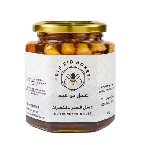 عسل سدر بالمكسرات500g - - احصل على تجربة غنية ومميزة مع عسل السدر الممزوج بالمكسرات الطازجة واللذيذة.- استمتع بنكهة متميزة ومغذية مع مزيج من عسل السدر الطبيعي والمكسرات اللذيذة.- اجعل تجربة تناول العسل أكثر إثارة مع عسل السدر الممزوج بالمكسرات الفاخرة.- اختبر الجودة العالية والنكهة الفريدة مع عسل السدر مع المكسرات الطازجة التي تمنحك الطاقة والتغذية.- تمتع بمذاق رائع وفوائد صحية مضاعفة مع مزيج عسل السدر والمكسرات الطازجة الذي يمنحك البروتين والفيتامينات الضرورية.