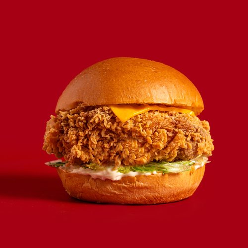 Chicken Fillet - Indulge in our Brioche chicken fillet sandwich, featuring a crispy, juicy chicken breast, your choice of mayo or hot sauce, fresh lettuce, and melted cheese,