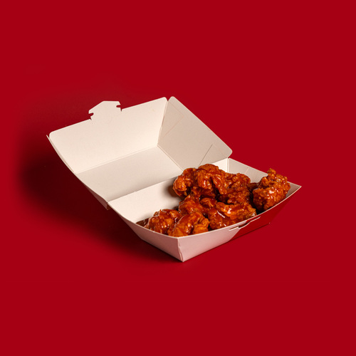 Buffalo Popcorn - Popcorn chicken pieces dipped in our famous hot buffalo sauce. This sauce gives a spicy and crunchy flavor at the same time.