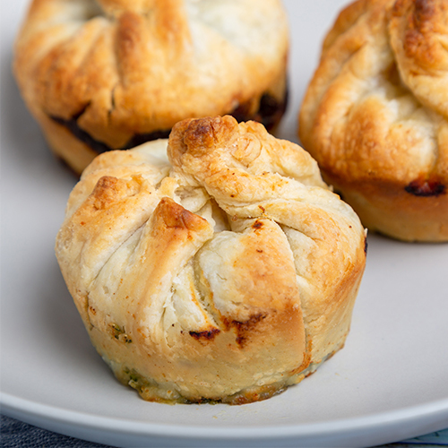 Vegetable Pie - Crispy dough stuffed with spinach, broccoli, corn and mushroom mixed with cheese.