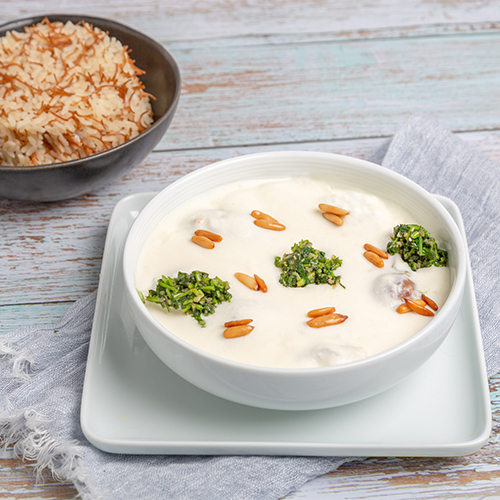 Basha W Asakrah - Kibbeh and sheesh barrak cooked in yogurt and served with vermicelli rice