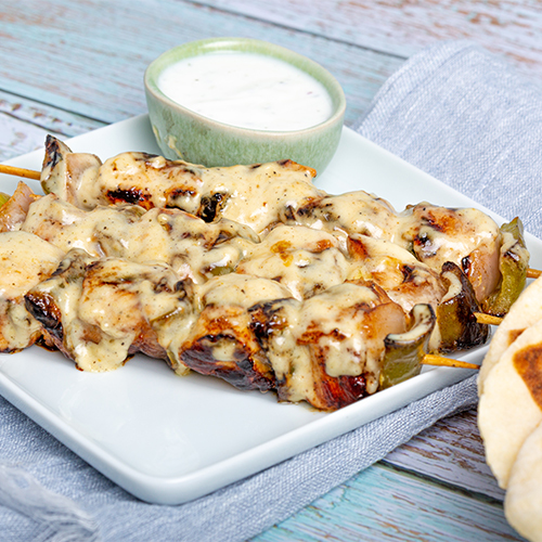 Shish Tawook - Grilled chicken breast cubes served with our special yogurt sauce