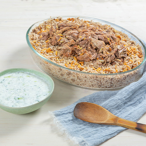 Middle Eastern Rice With Meat Gathering - Rice mixed with minced beef, spices, topped with nuts, served with meat and cucumber yogurt salad 
 Enough for 6 people