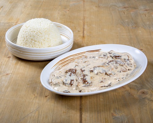 Creamy Mushroom Veal - Veal cooked with mushroom and cream served with a side of white rice